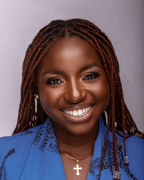 Portrait of black woman smiling in studio shoot